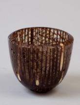 Cardboard and bamboo embedded in resin